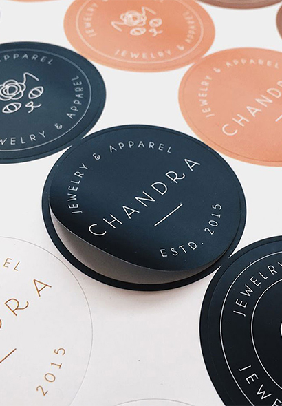 Branded stickers and labels developed by packaging material manufacturers for professional packing solutions.